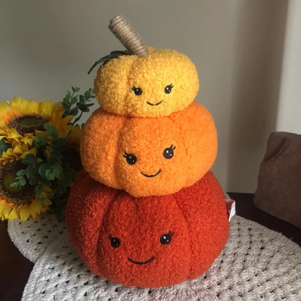 Stacked SHERPA Pumpkins with Smiley Faces